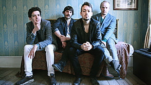 band photo on sofa HD wallpaper