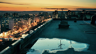 black and white concrete building, cityscape, rooftops, sunset, HDR