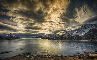 body of water and snow covered mountains, landscape, beach, mountains, sky