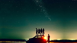 silhouette of peoples standing on the car during sun rise HD wallpaper