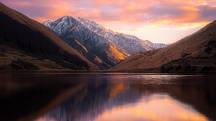 body of water and mountains