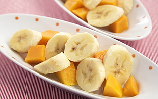 sliced banana and mango on plate HD wallpaper