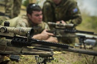 gray and black sniper rifle macro photography