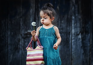 toddler's wearing green sleeveless dress