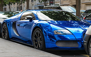 parked blue sports coupe