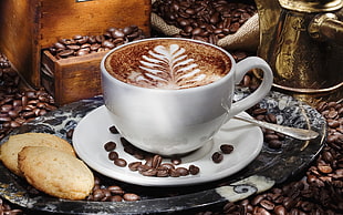 white ceramic mug filled with cappuccino