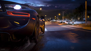 time-lapsed photography of black luxury car on asphalt road during night time