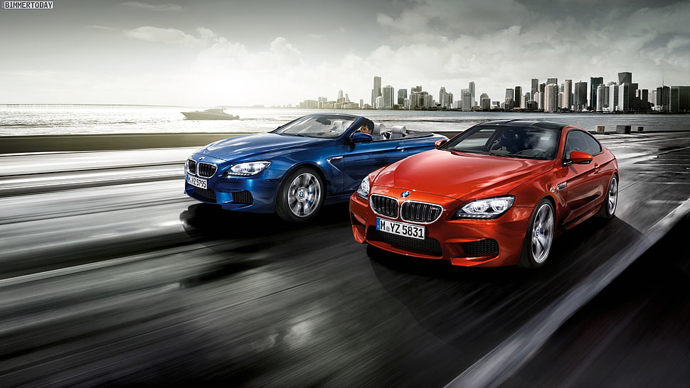blue and orange BMW advertisement cars HD wallpaper