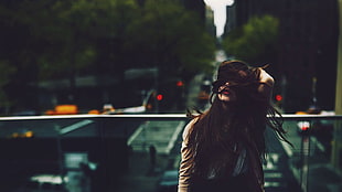 woman touching her hair