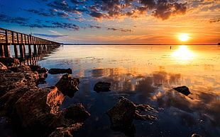 silhouette photography of dock under golden hour, bridge, sky, clouds, sunset HD wallpaper