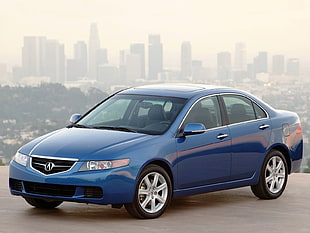 blue Acura TL parked on concrete pavement HD wallpaper