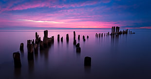 photo of still water and rocks