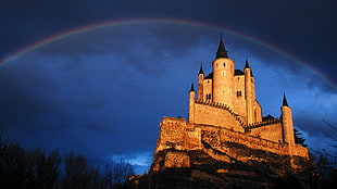 gray castle under rainbow HD wallpaper