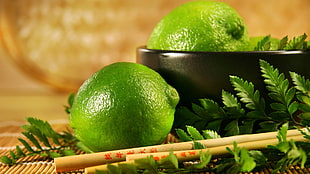 two limes, limes, food, chopstick HD wallpaper