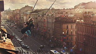 woman swinging above buildings digital wallpaper HD wallpaper