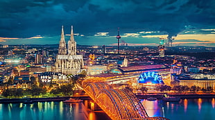 bridge between body of water near buildings under blue sky at nighttime, city, cityscape, Germany, Cologne