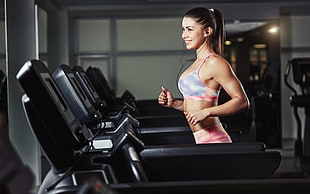 woman in blue and red sports bra