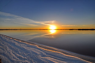 seashore during golden hour