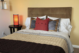 beige, red, and black comforter set HD wallpaper