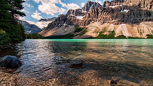 river facing cliffs, beach, mountains, water, Bow Lake