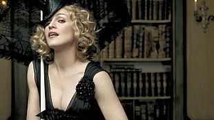 Madonna wearing black plunging dress and black hat HD wallpaper