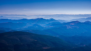 aerial view of the rainforest covered mountains HD wallpaper