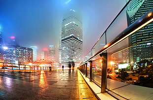 white concrete building, city, mist, city lights, urban HD wallpaper