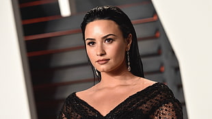 Demi Lovato in black v-neck top HD wallpaper
