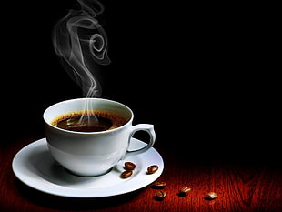 white ceramic cup with coffee