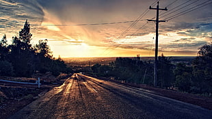 empty road during sunset HD wallpaper
