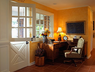 brown rolling office chair near white wooden door HD wallpaper