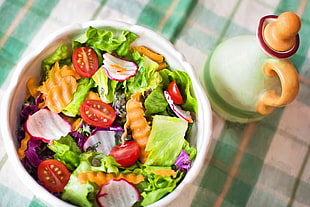 vegetable salad in white bowl