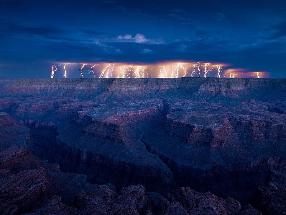 landscape photography of lightning on brown mountain HD wallpaper