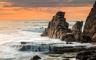 body of water and brown rock, nature, landscape, coast, sea