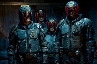 photo of four men wearing black armors