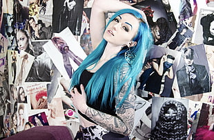 blue haired woman surrounded by posters HD wallpaper