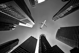 gray scale photo of building low angle photography