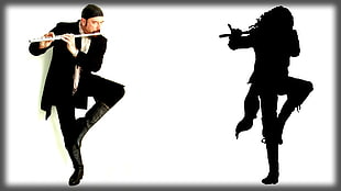 man in black suit playing flute HD wallpaper
