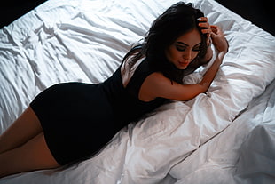 woman in black dress on top of white bed HD wallpaper