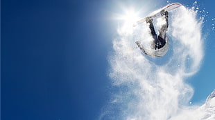 white snowboard, snow