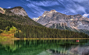 lakeside view of mountains during day time HD wallpaper