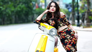woman wearing multicolored cold-shoulder shirt near motor scooter HD wallpaper