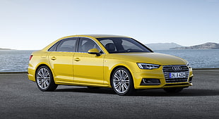 yellow Audi A6 sedan