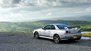 white coupe in top of mountain HD wallpaper