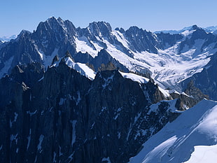 aerial photography of snow coated mountains