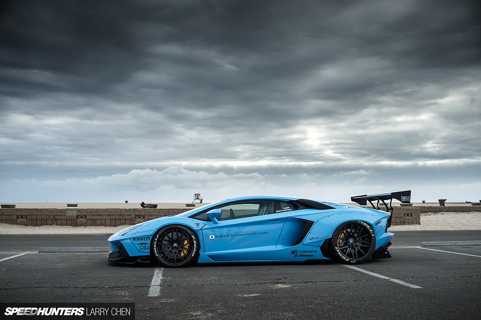 Blue supercar on road under cloudy sky HD wallpaper | Wallpaper Flare