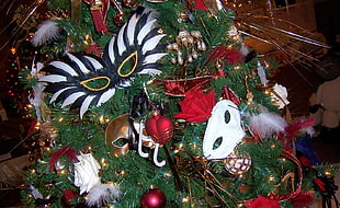 green and multicolored Christmas tree with masquerade masks HD wallpaper