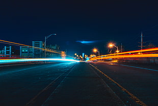 timelapse photography of teal and orange lights