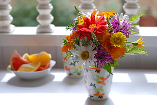 red , white and yellow flower arrangement in white ceramic vase HD wallpaper