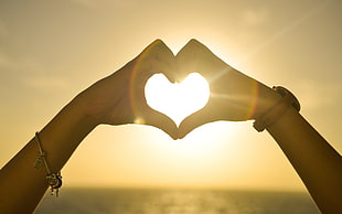 person's heart hand gesture, couple, Sun, sea, watch